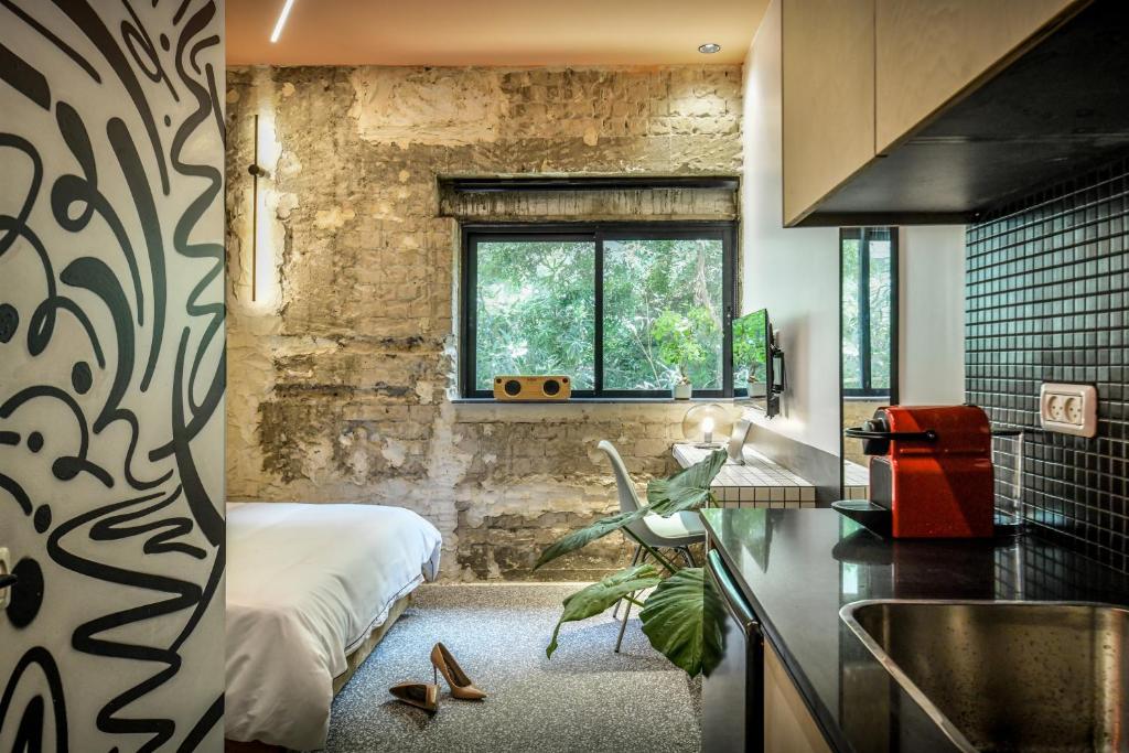 Kuchyň nebo kuchyňský kout v ubytování Pixel - by Loginn Tel-Avivian hotels