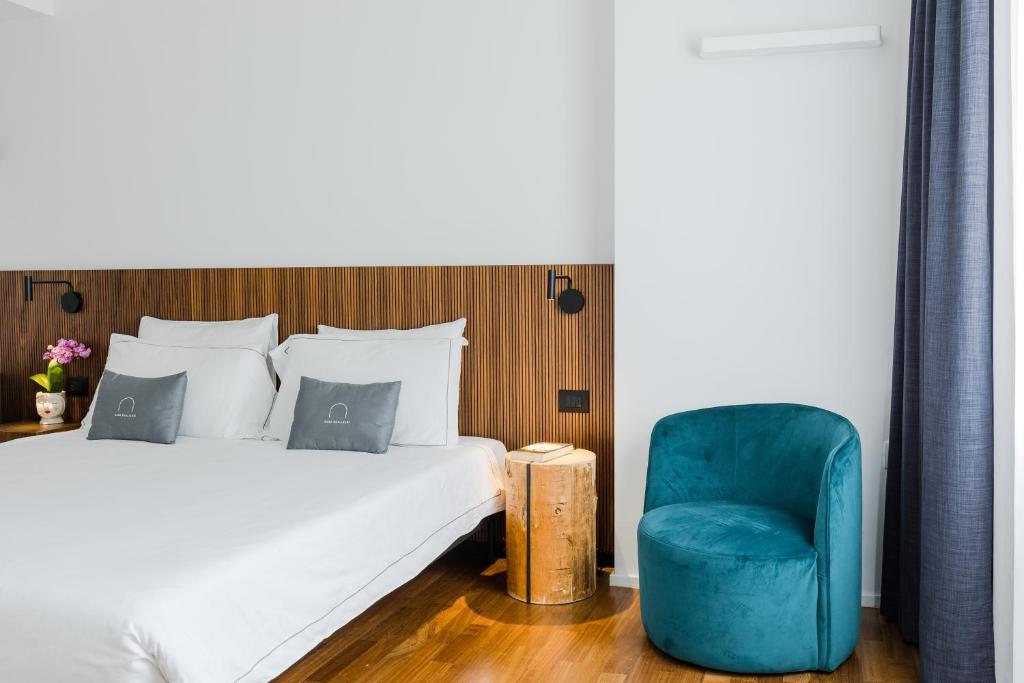 Postel nebo postele na pokoji v ubytování Hotel Casa Scaligeri