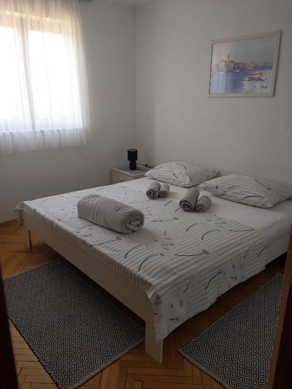 Postel nebo postele na pokoji v ubytování Apartment Fugosic