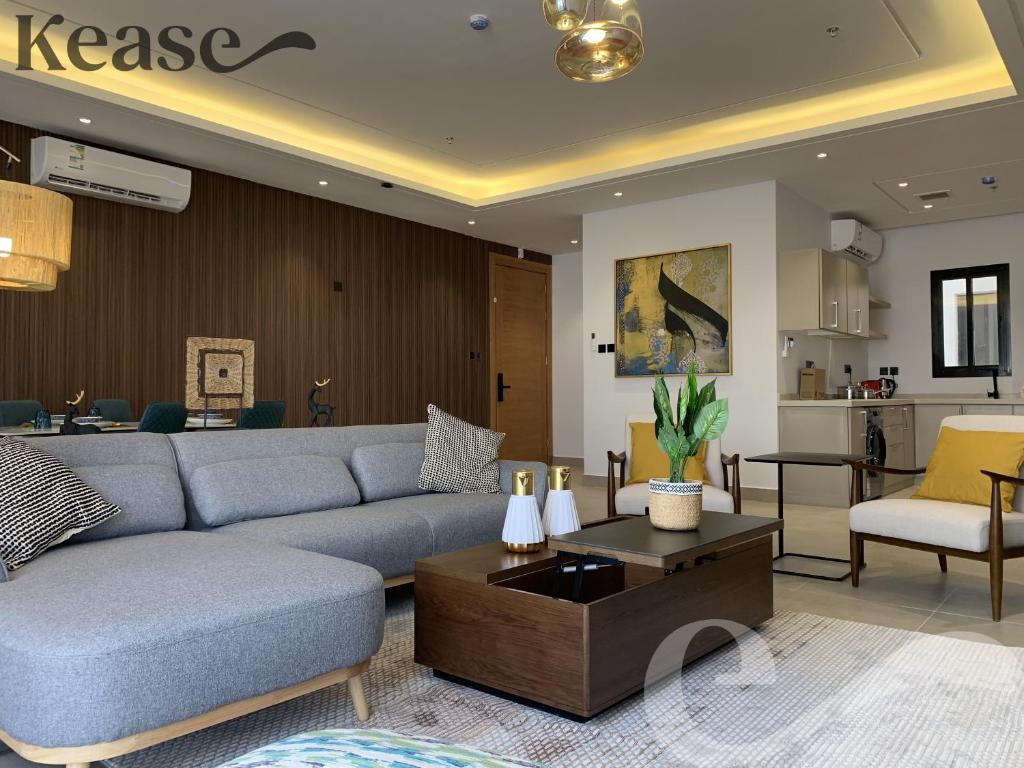 a living room with a couch and a table at Kease Malqa B-11 Royal touch AZ60 in Riyadh