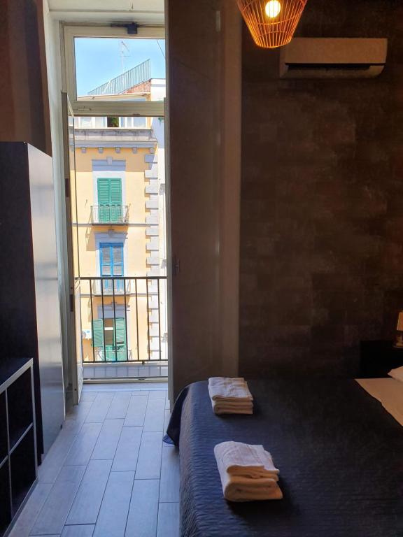Posteľ alebo postele v izbe v ubytovaní EmyJo Central B&B