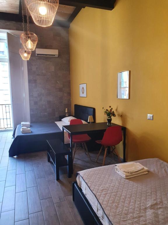 Posteľ alebo postele v izbe v ubytovaní EmyJo Central B&B