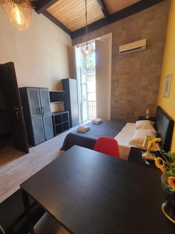 Posteľ alebo postele v izbe v ubytovaní EmyJo Central B&B