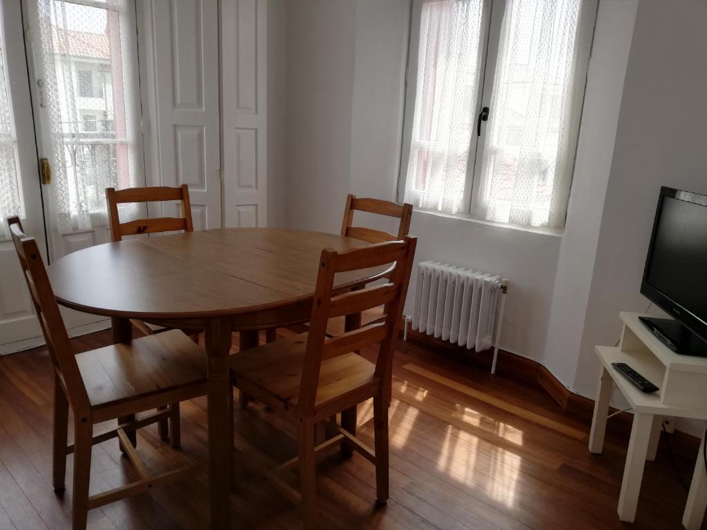TV a/nebo společenská místnost v ubytování Apartamentos Turísticos La Solana