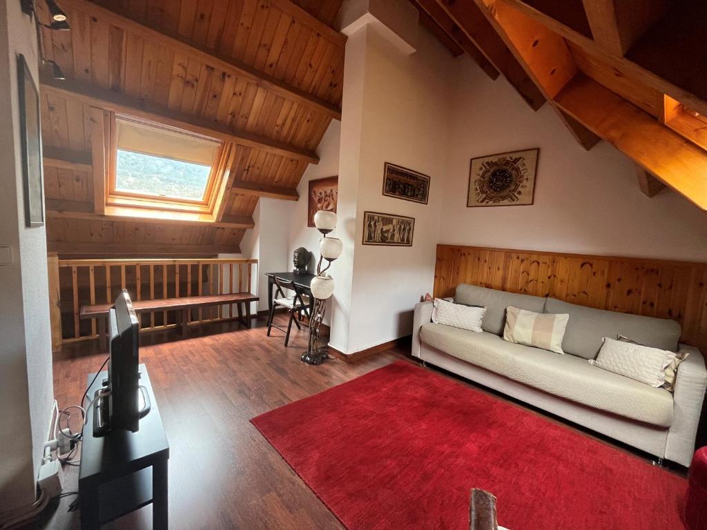 Posedenie v ubytovaní Duplex 80 m2 con vistas a la montaña