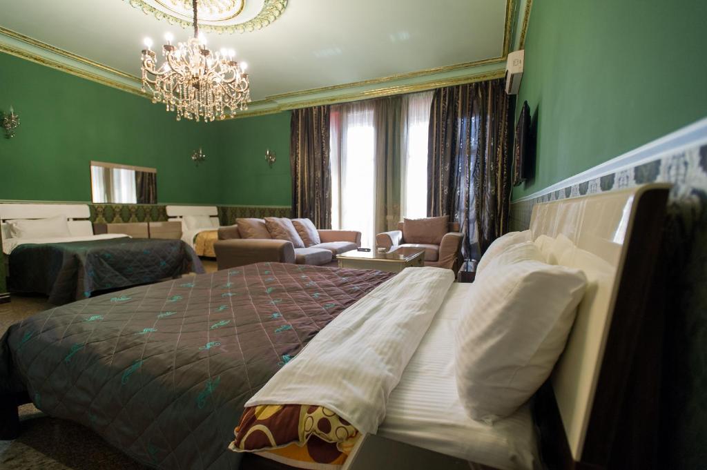 Postel nebo postele na pokoji v ubytování hotel amber