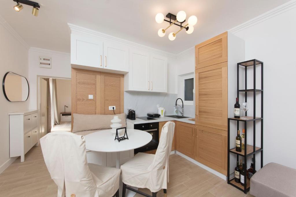 Cuisine ou kitchenette dans l'établissement Spring Apartment