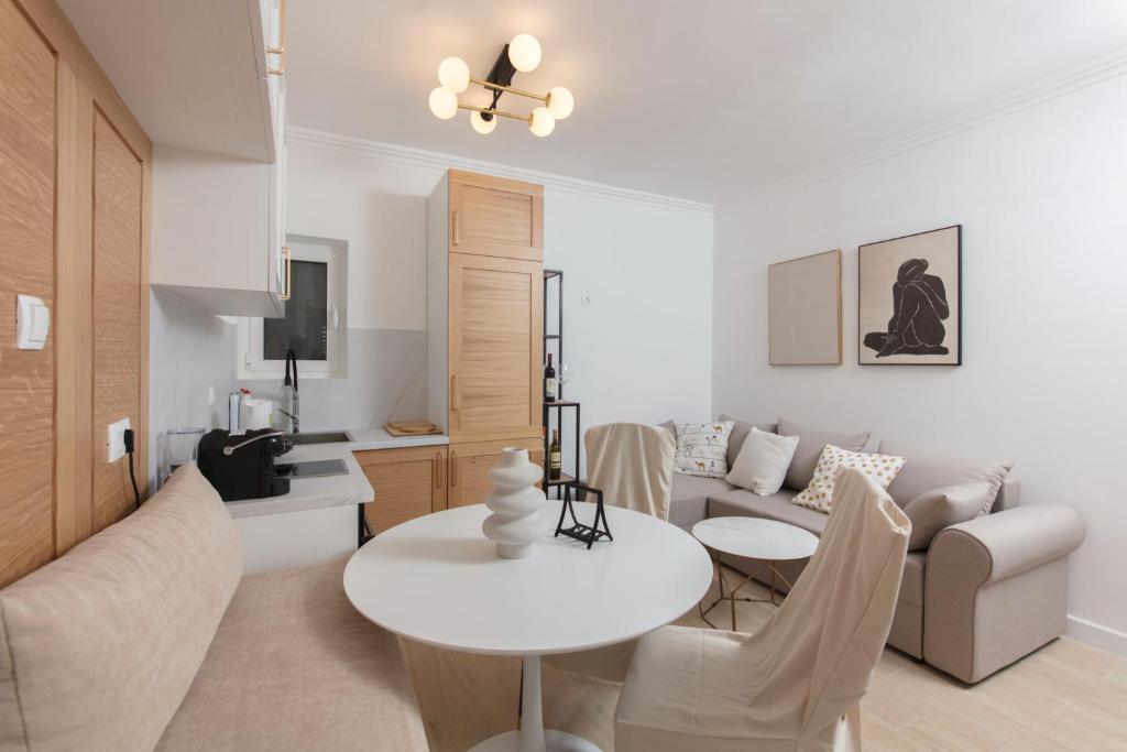 Coin salon dans l'établissement Spring Apartment