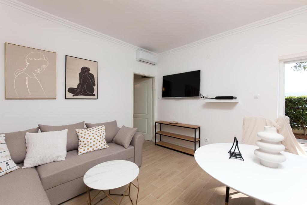 Télévision ou salle de divertissement dans l'établissement Spring Apartment