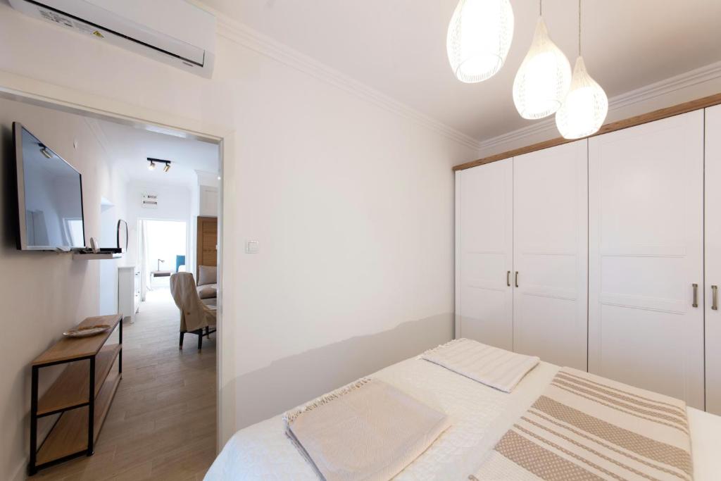 Un ou plusieurs lits dans un hébergement de l'établissement Spring Apartment