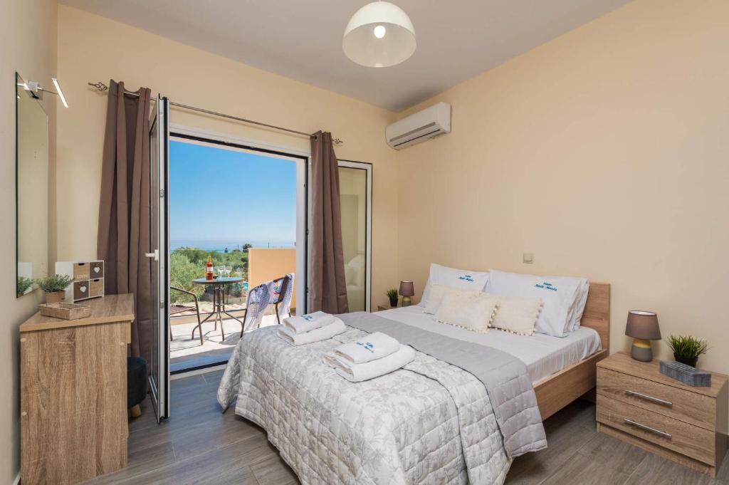 Posteľ alebo postele v izbe v ubytovaní Villa Hali Maris by Villa Plus