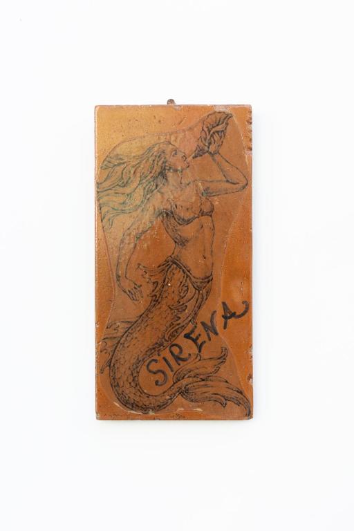 a drawing of a mermaid on a piece of paper at La Bella Annacapri in Anacapri
