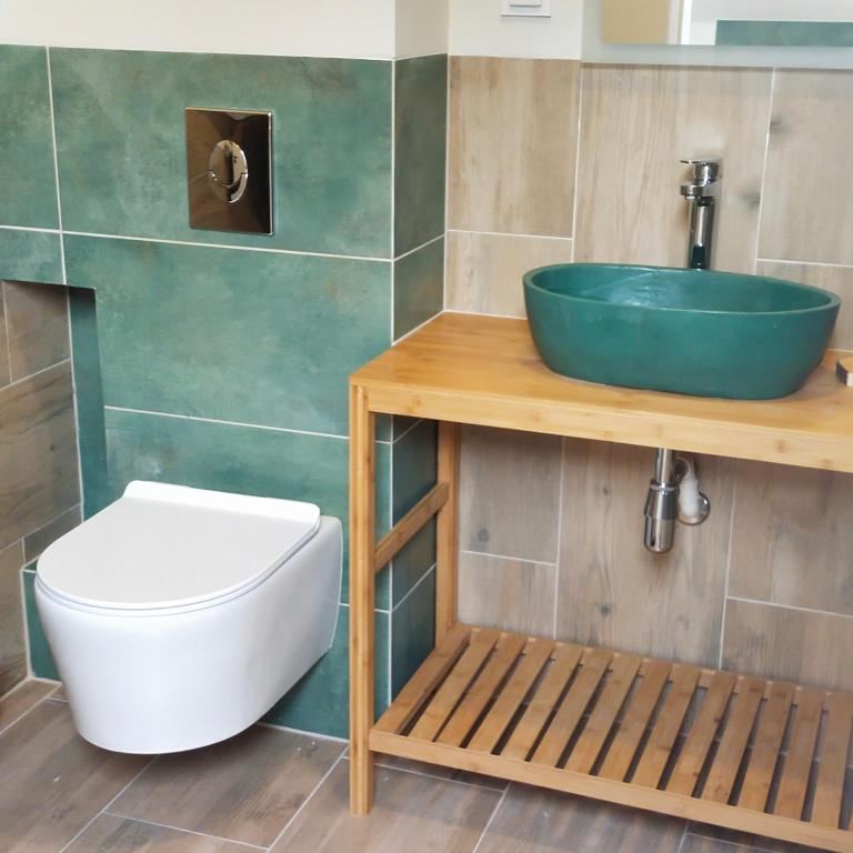 Koupelna v ubytování Apartamenty Heweliusz House