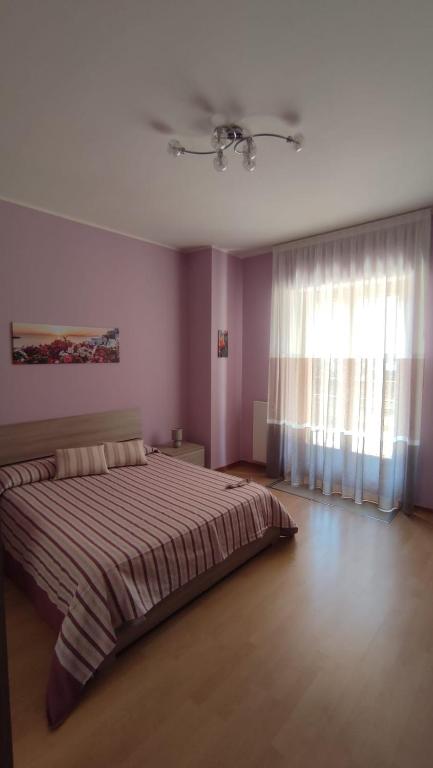 A bed or beds in a room at R Family