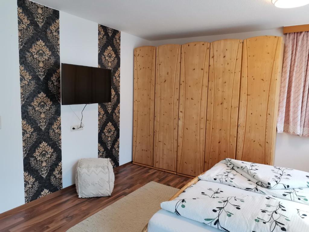 Postel nebo postele na pokoji v ubytování Appartement Erika