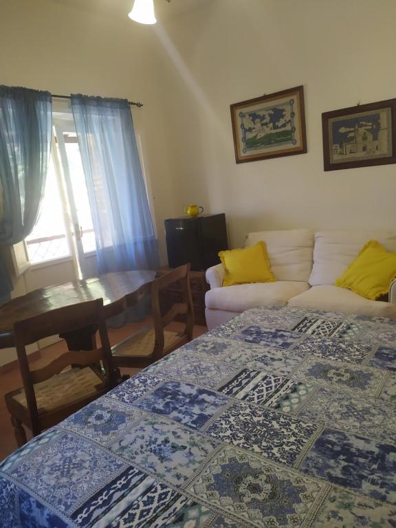 Postel nebo postele na pokoji v ubytování Camere le cascatelle