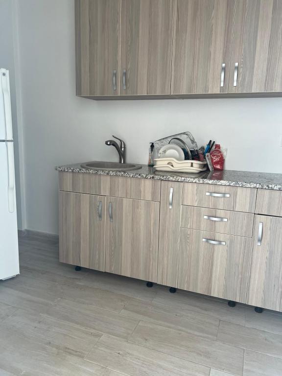 Kuchyň nebo kuchyňský kout v ubytování Apartments Stuart