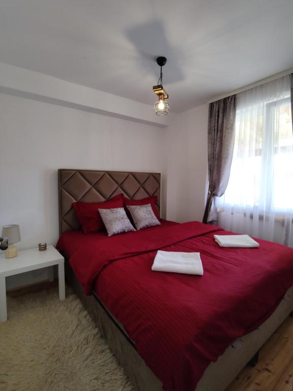 Letto o letti in una camera di Apartments CENTER OF THE WORLD