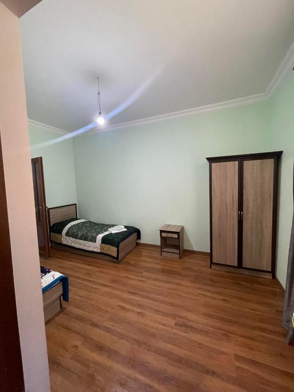 Postel nebo postele na pokoji v ubytování Old Jermuk
