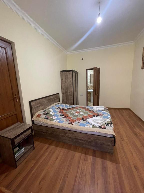 Postel nebo postele na pokoji v ubytování Old Jermuk