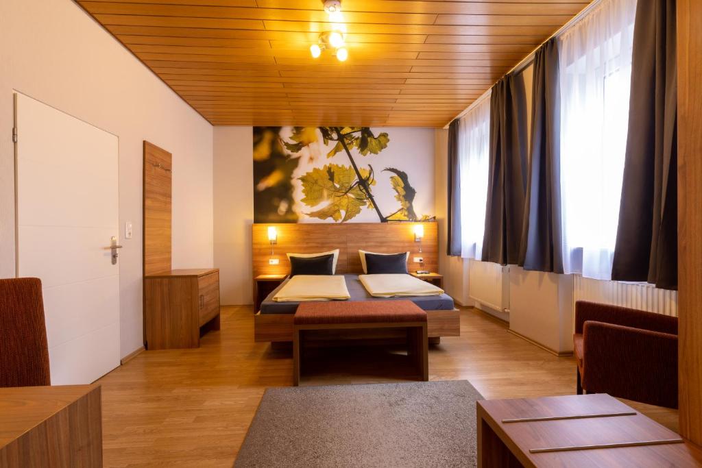 Postel nebo postele na pokoji v ubytování Zur Lindenau
