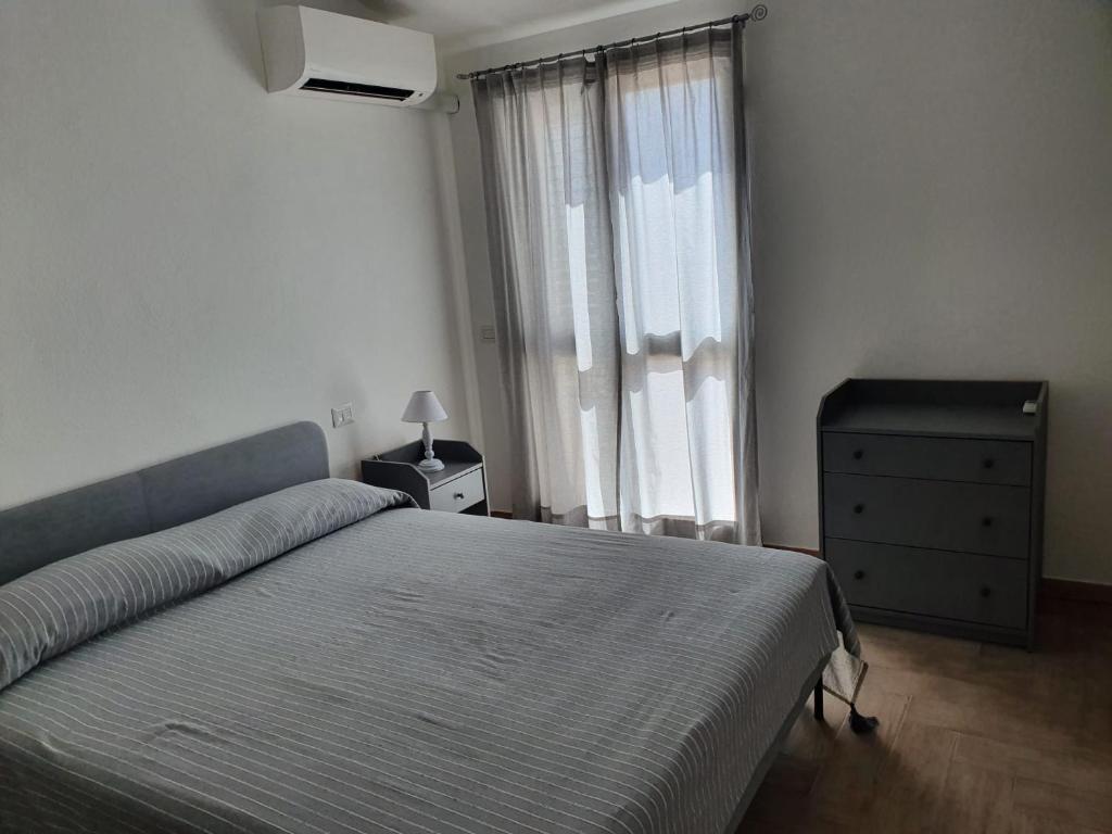 Postel nebo postele na pokoji v ubytování La Casa di su