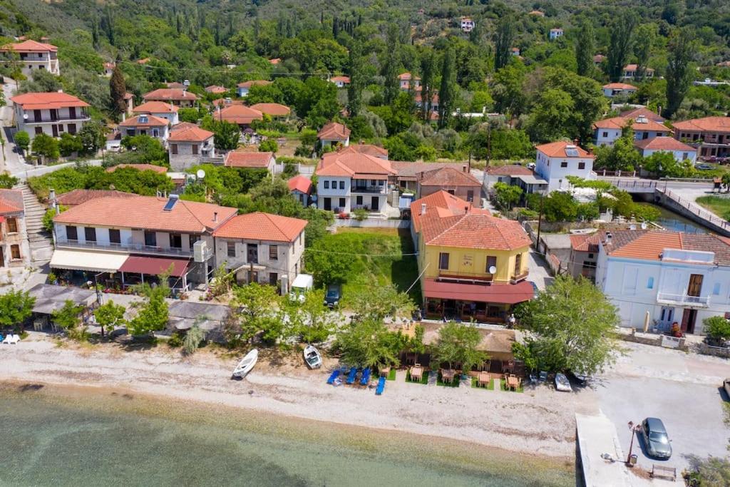 an aerial view of a small town on a beach at Zmas Studios in Chorto