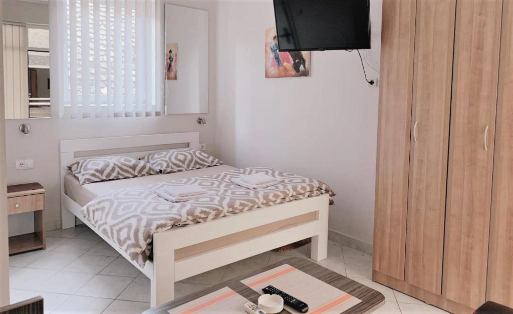 Voodi või voodid majutusasutuse Atrijum apartmani Apatin toas