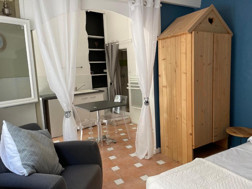 Postel nebo postele na pokoji v ubytování Maison Capucine