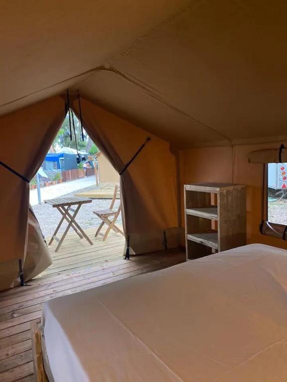 A bed or beds in a room at Camping Miramar Playa - cama doble