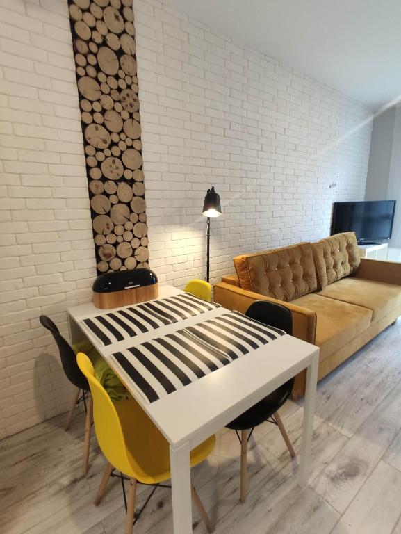 Televízia a/alebo spoločenská miestnosť v ubytovaní Black House