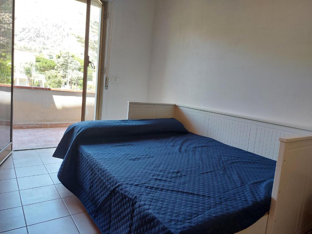 A bed or beds in a room at I love Mondello