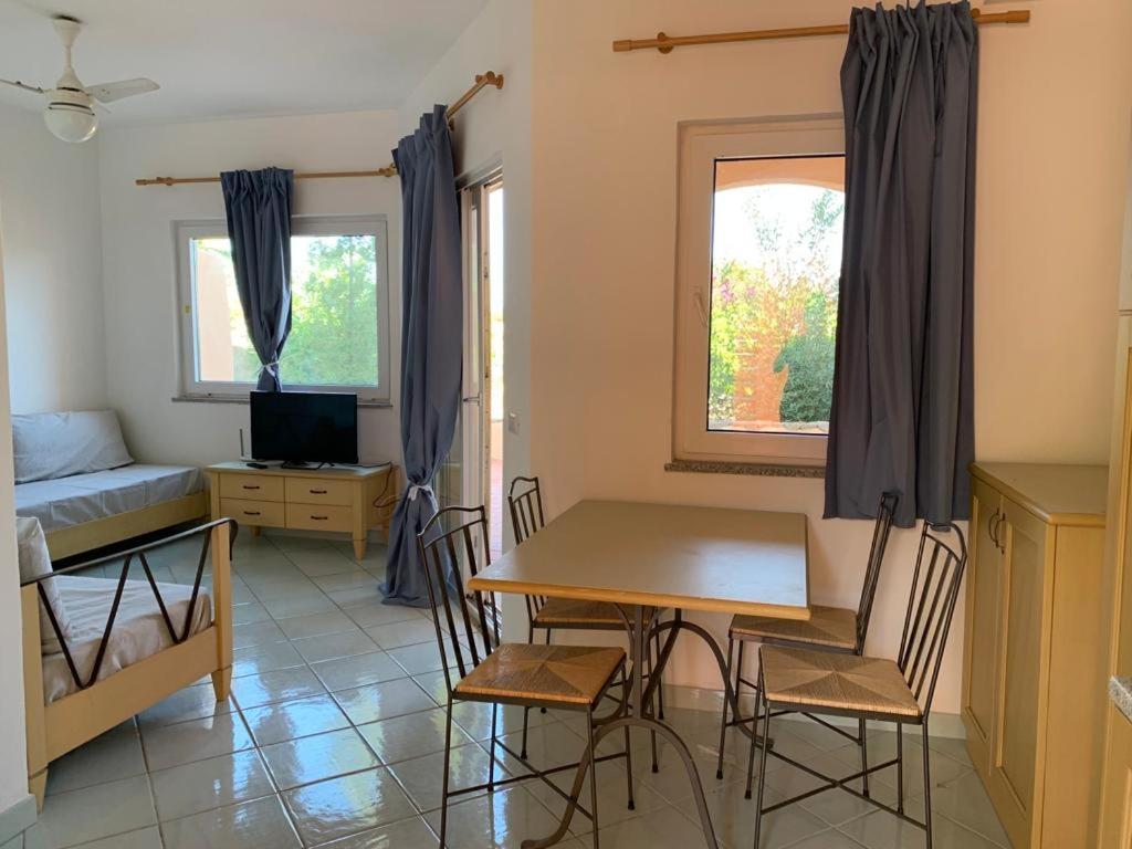 TV a/nebo společenská místnost v ubytování Residence Cala Rossa