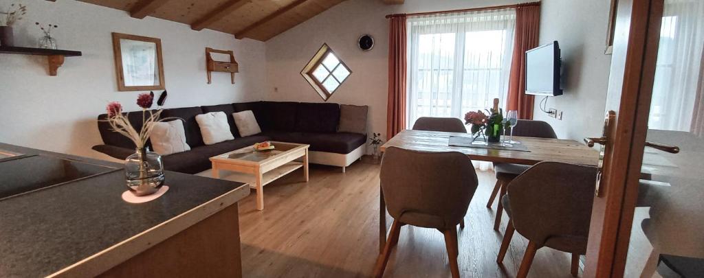 Televízia a/alebo spoločenská miestnosť v ubytovaní Appartement Thunhart Manfred & Doris