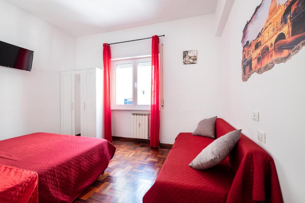 Posteľ alebo postele v izbe v ubytovaní Take It Easy Roma Guest House