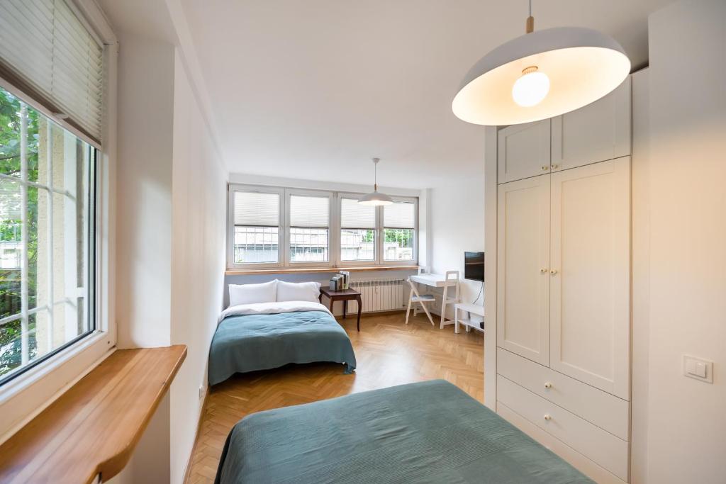 Posteľ alebo postele v izbe v ubytovaní Royal Route Marvelous Apartment