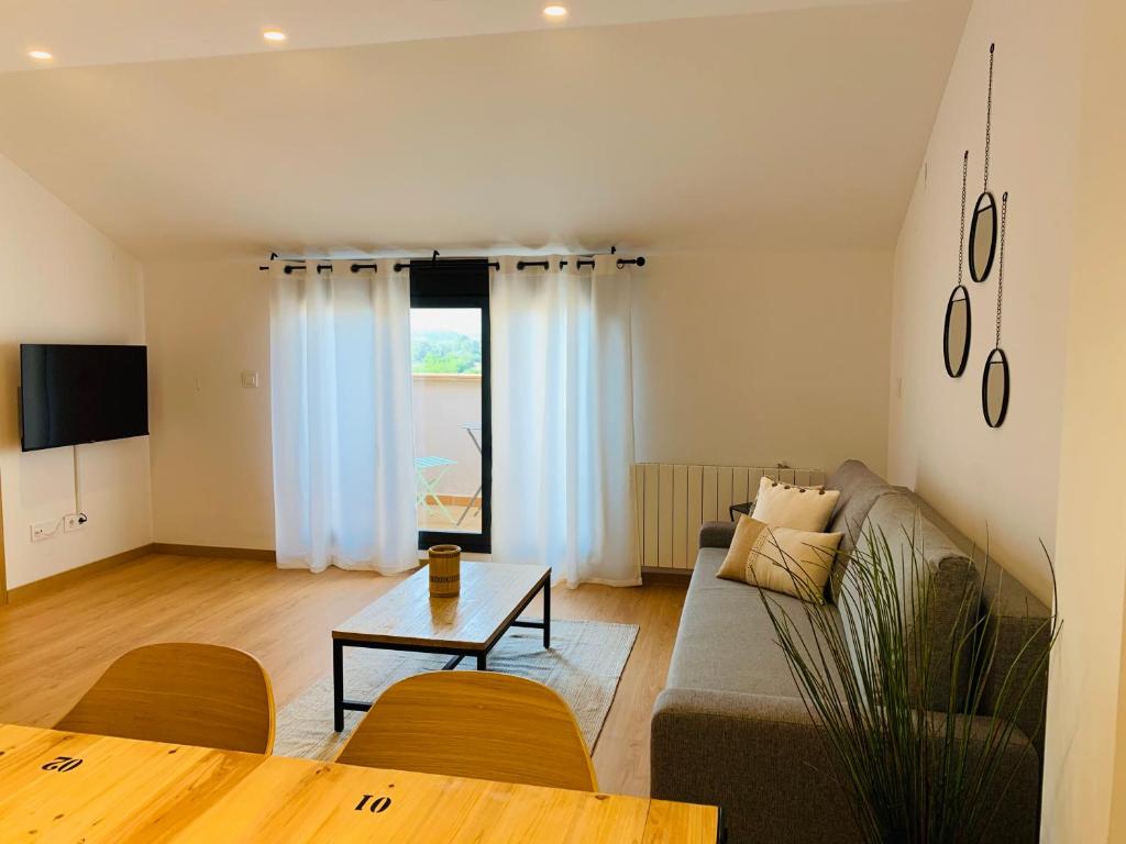TV a/nebo společenská místnost v ubytování Apartamentos Best Ainsa
