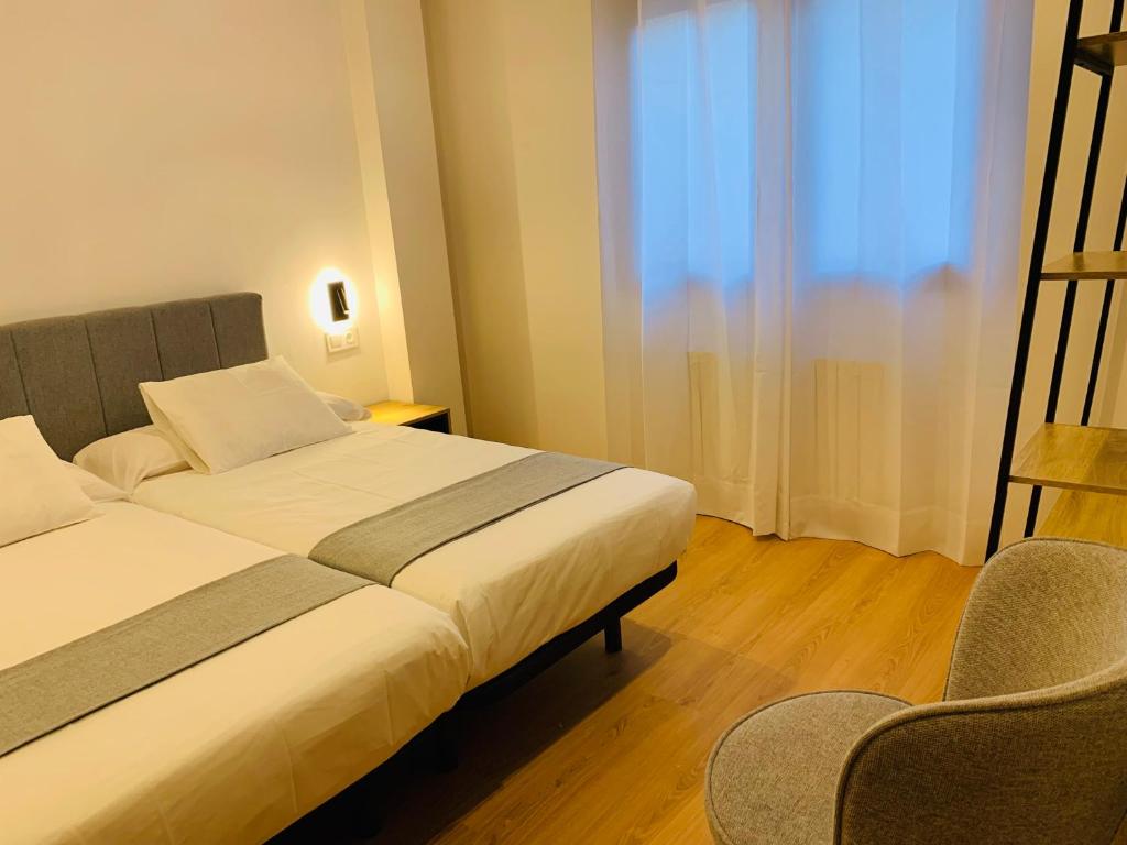 Postel nebo postele na pokoji v ubytování Apartamentos Best Ainsa