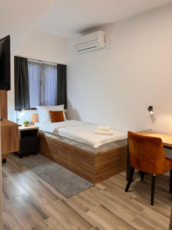 Postel nebo postele na pokoji v ubytování Prenociste kod Brana