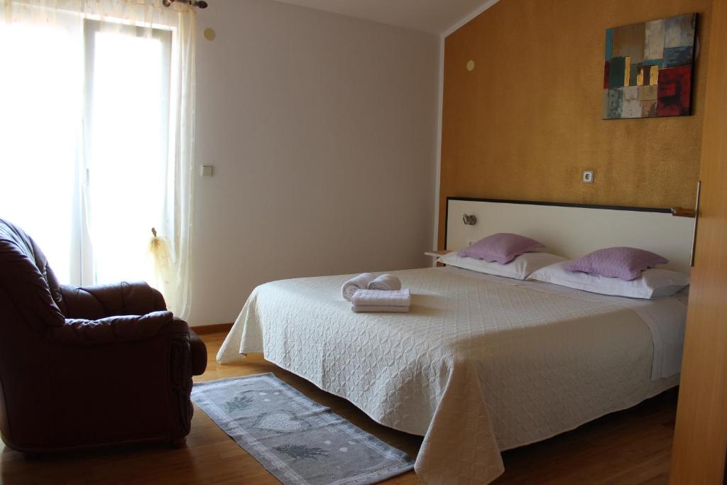 Postel nebo postele na pokoji v ubytování Apartment BenTen