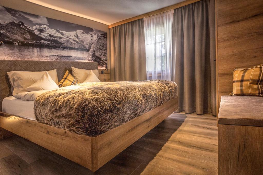 Postel nebo postele na pokoji v ubytování Arcade Apartments & Spa