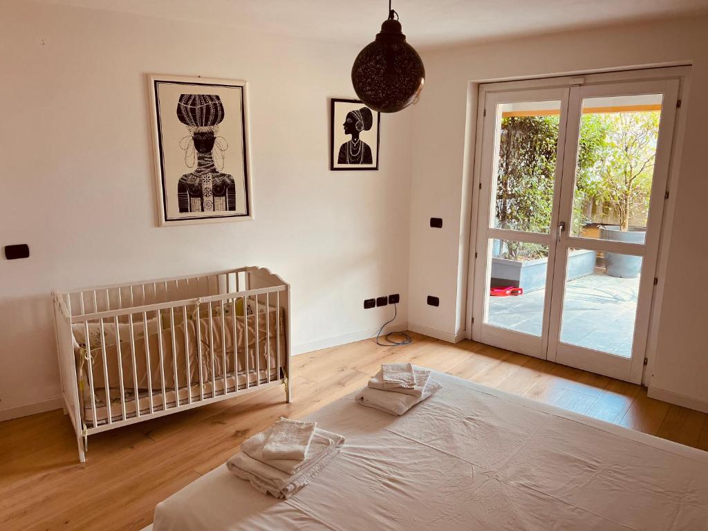 Posteľ alebo postele v izbe v ubytovaní Sunset Feel House