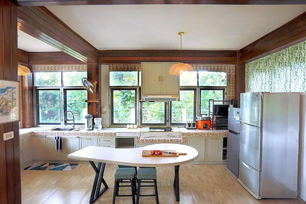 Kuchyň nebo kuchyňský kout v ubytování Evergreen Pakchong Home