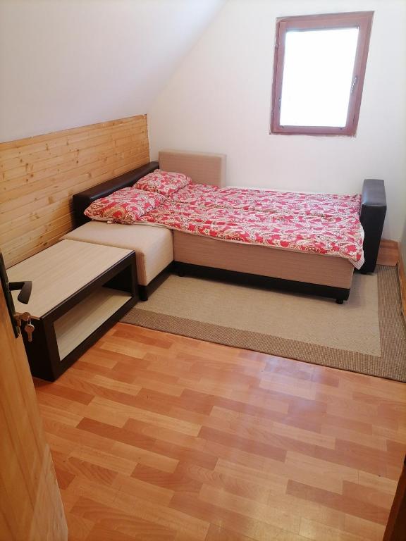 Postel nebo postele na pokoji v ubytování VUK sobe