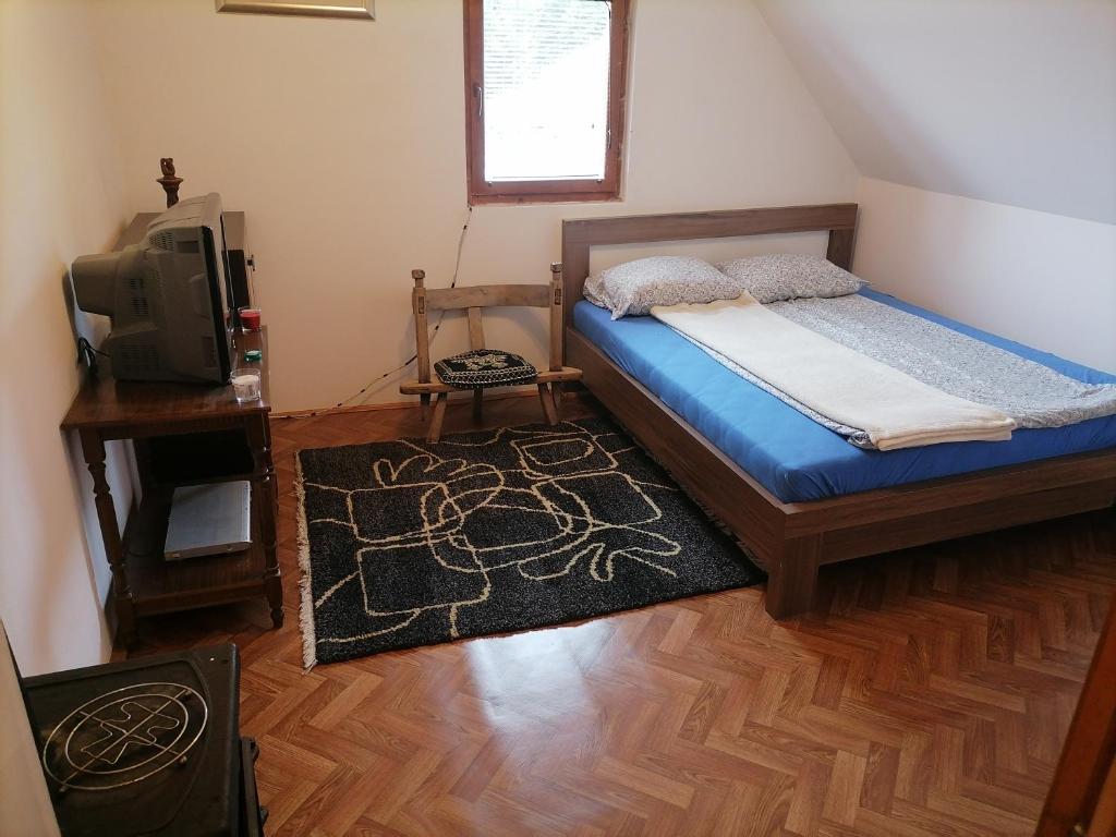 Postel nebo postele na pokoji v ubytování VUK sobe