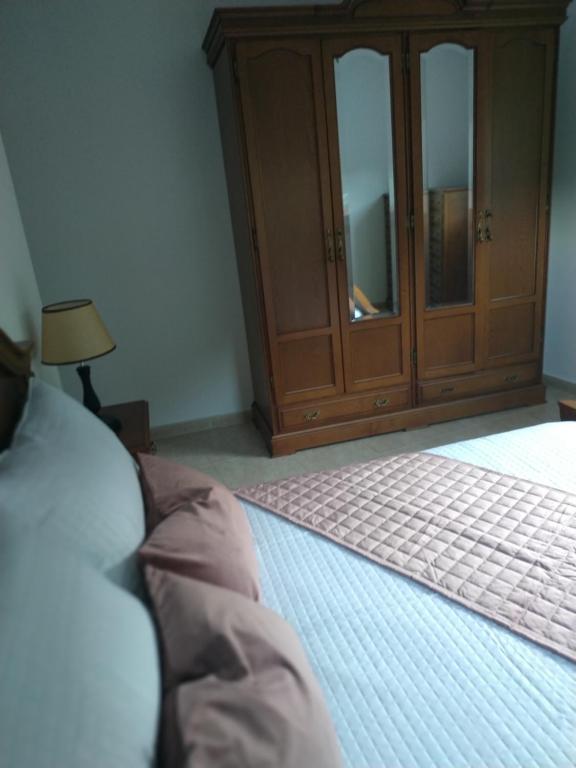 A bed or beds in a room at Casa Xarreiro