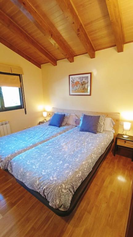 Postel nebo postele na pokoji v ubytování Magnífica casa con jardin, BBQ e hidromasaje