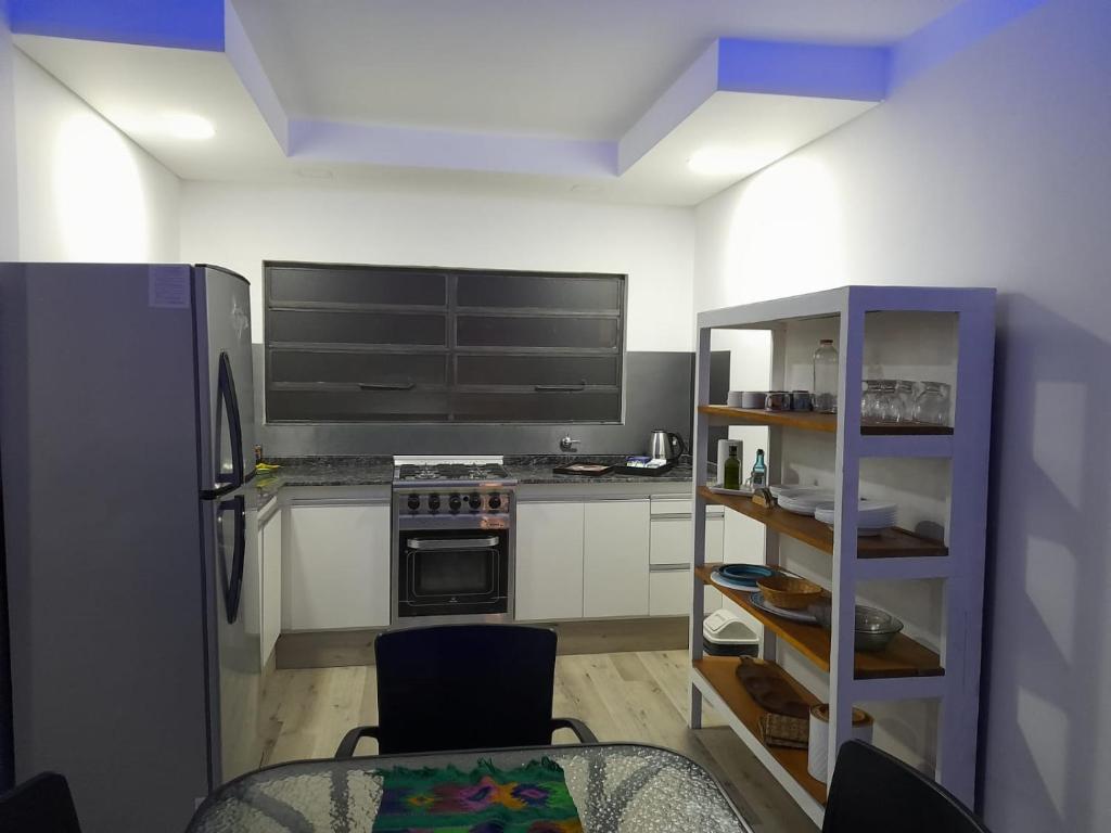 Kuchyň nebo kuchyňský kout v ubytování CASA CONFORTABLE II