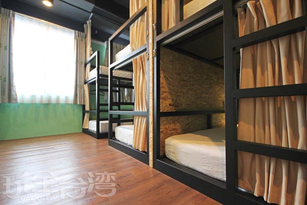 Postel nebo postele na pokoji v ubytování Tourist Bunny Hostel