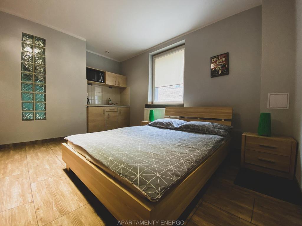 Posteľ alebo postele v izbe v ubytovaní Apartamenty Energo